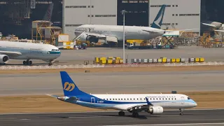 Regional airliner Embraer of Mandarin Airlines running and taking off