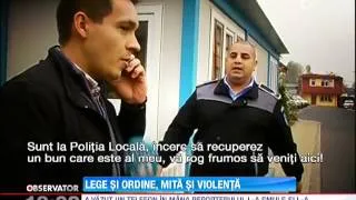 Poliţist local acuzat de luare de mită, violent cu presa