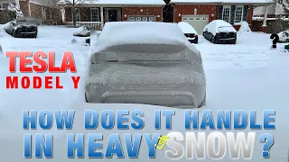 How does the Tesla Model Y handle in HEAVY SNOW?