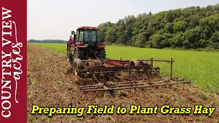 Disc Harrowing Field, Preparing it to plant with Grass Hay