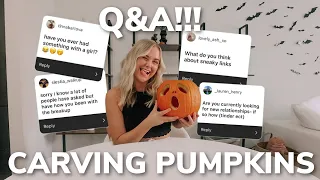 carving a pumpkin while answering your questions!!