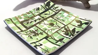 Have you tried layering stencils & silkscreens on polymer clay before?