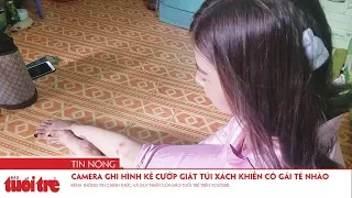 Camera ghi hình kẻ cướp giật túi xách khiến cô gái té nhào