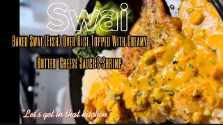 Baked Swai (Fish) Over Rice Topped With Creamy Butter  Cheese Sauce & Shrimp