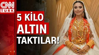 5 kilo altın takılan gelin ayakta duramadı!