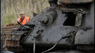 THE RISE OF THE T-34 TANK FROM THE SWAMP PIERCED BY A GERMAN CANNON