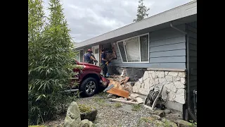 Man seriously hurt as truck slams into WA home | FOX 13 Seattle