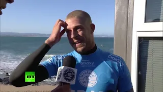 Jaw dropping  Surfer fights off shark attack live on TV in S  African competition