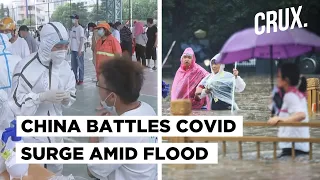 China’s Double Trouble: Wuhan To Test All Citizens As Covid Cases Surge; Flood Death Toll Over 300