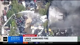 Injuries reported after massive fire at junkyard in Billerica