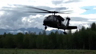 Paratroopers Jump Into Big Lake In Alaska