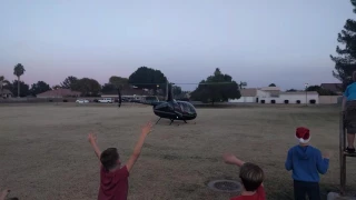 Santa takes off to the north pole in helicopter