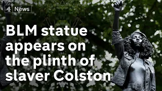 Statue of slaver Edward Colston unofficially replaced with sculpture of Black Lives Matter protester