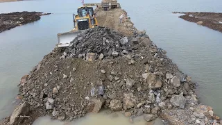 Amazing Foundation road building construction mighty bulldozer pushing rock and Truck unloading rock