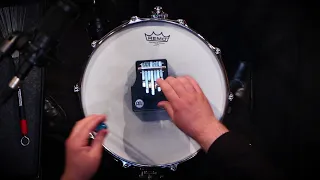 "SyNc" for Solo Snare Drum by Gene Koshinski