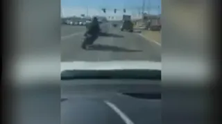 Police searching for aggressive motorcycle driver after road rage incident turns physical