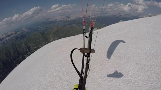 Launching  from Marmolada summit with a paraglider