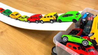 Various Diecast Model Cars Moving Down On Slider