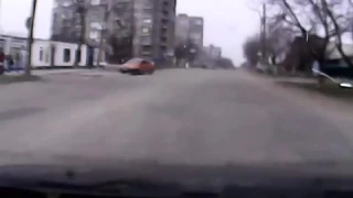 A man in a car hit by shelling, the city of Mariupol, Ukraine. CAUTION - shocking video!