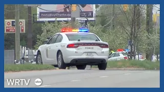 Two IMPD officers shot, suspect dead after pursuit on city's east side