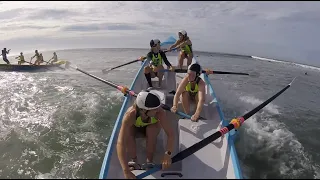 Lorne girls take on big surf at the 2020 Torquay Surfboat Carnival