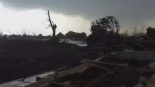 Emerging from storm shelter to destruction