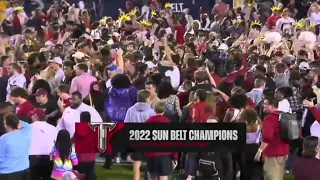 Troy fans storm the field after beating Coastal Carolina to win 2022 Sun Belt Championship