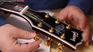 A Guitar Builder Looks at a Chinese made FAKE Gibson Supreme Chibson Guitar