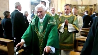 Pope Emeritus Benedict XVI at the end of a Mass