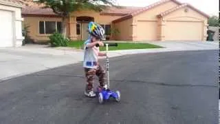 Brody on his Mini Micro Scooter age 2