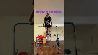 Beginner gymnastics bar tricks