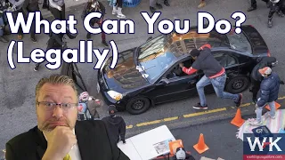 What Can You Do If a Mob Surrounds Your Car?