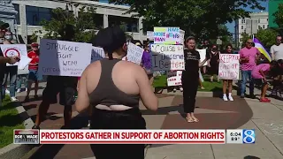 Pro-abortion rights demonstrators gather in Grand Rapids