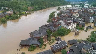 Torrential rains cause flooding in southern China