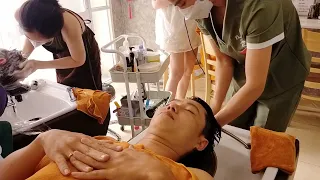 Her beauty and talent for massaging are undeniable, Vietnam Barbershop