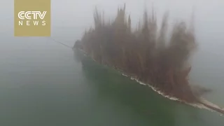 Watch: Lake embankment in China demolished to reduce levee breach