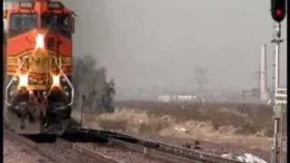 He knocked my camera over( do not try this)  BNSF Z-train at 70 MPH!!!!!!!!