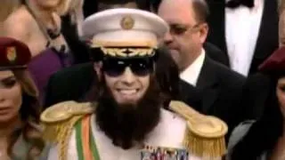 Sacha Baron Cohen Attends Oscars as "The Dictator" (Raw Video)