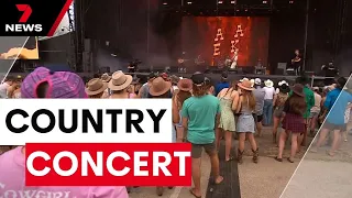 Music fans rock on at Australia's biggest country festival | 7 News Australia