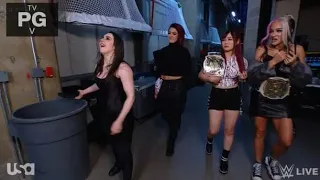 Nikki Cross tosses the 24/7 Title in a trash can