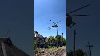 Russian Mi-8 military helicopter firing missiles & deploying flares