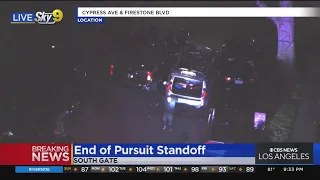 Pursuit suspect surrenders to police after short standoff