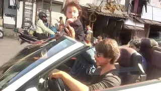 Shahrukh Khan with his CUTE Son AbRam Riding Open BMW Car On Mumbai Roads