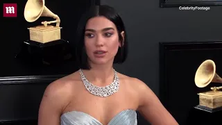 Silver siren! Dua Lipa flaunts curves in shiny gown at Grammys