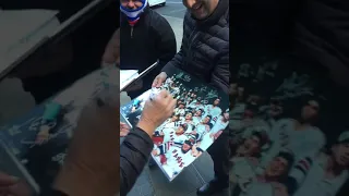 New York Rangers 1994 Stanley Cup champion GM Neil Smith signing autographs in New York City