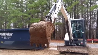 Bobcat Mini Excavator Crushing garbage in Dumpster (For practice!)