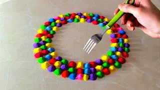 Easy and quick multi-coloured flower rangoli using FORK | Easy rangoli trick | festival rangoli easy
