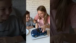 Mark and mom cut a Tesla car cake #shorts