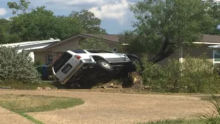 North Side Rollover narrowly misses home, sends 1 man to hospital, SAFD says