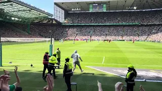 Celtic fan tackled to ground on trophy day